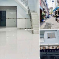 Nhà đẹp hẻm xe hơi sát mặt tiền, 1 trệt 1 lầu 2 phòng ngủ, gần chợ Bà Chiểu, kinh doanh tốt.
