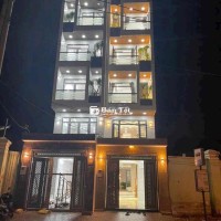 Bán Nhà MTKD 5.5 Tấm cao cấp có thang máy 450kg.DT: 4x27m.Nhà 5.5 tấm