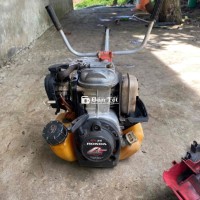 em có máy honda gx35 4 thì xăng riêng nhớt riêng