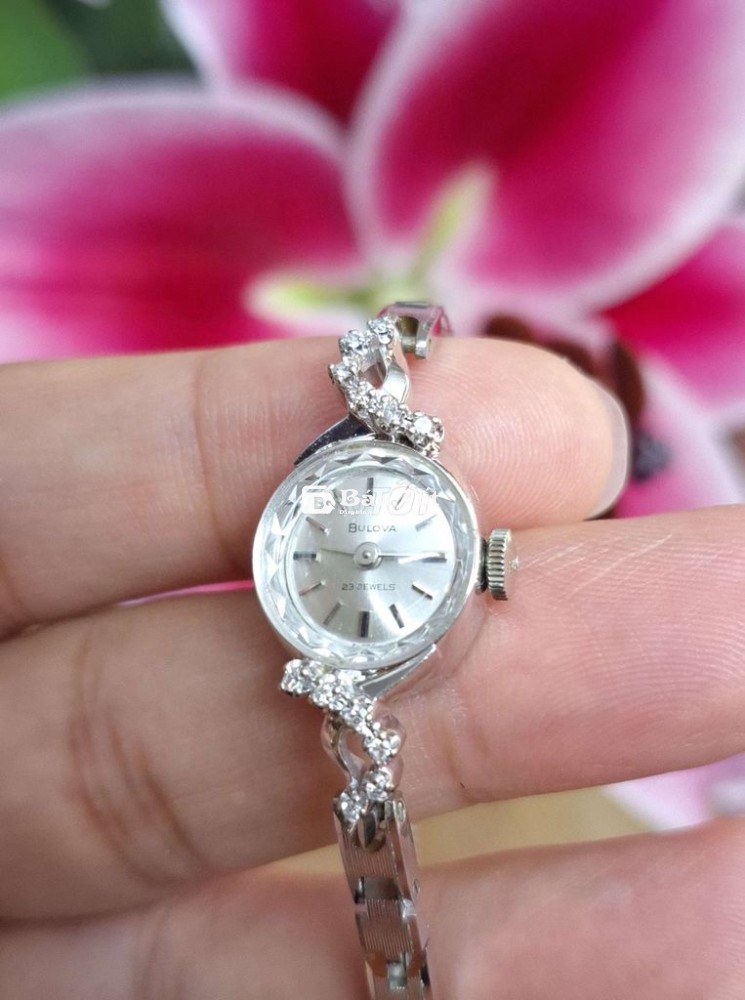 ĐỒNG HỒ LẮC Bulova vỏ Vàng trắng 14k