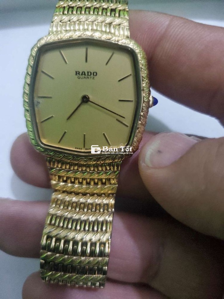 Rado pin thụy sỹ dây vàng.