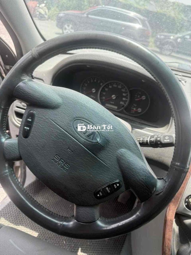 Kia Carnival 2007 GS 2.5 MT - 155000 km: Xe nhà, bảo dưỡng kỹ, giá tốt!